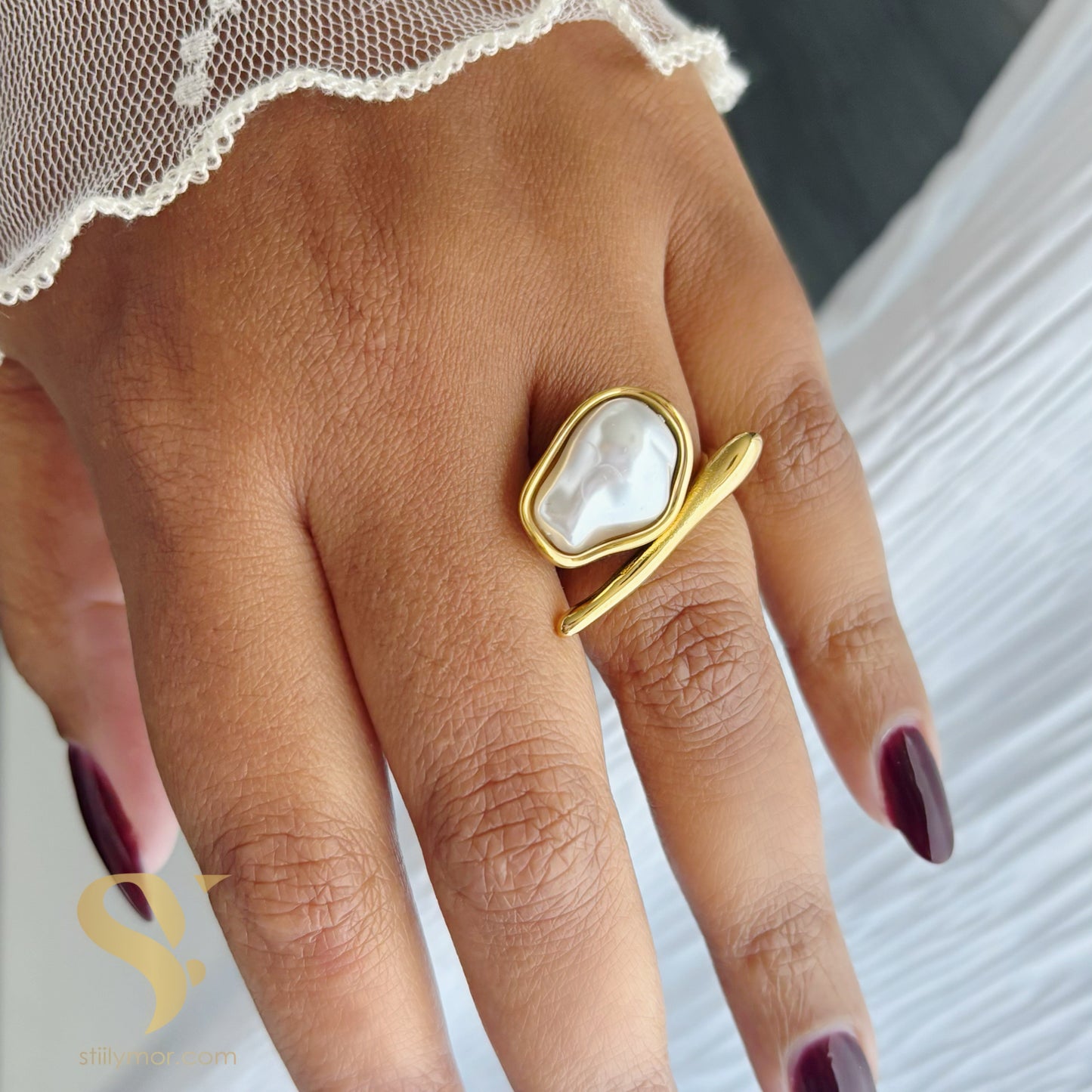 Anillo Perla alargada ajustable 7-9