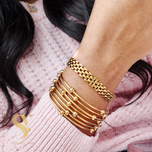 Semanario Balines dorado 7pcs